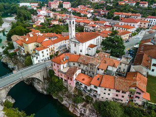 Colorful Architecture of Kanal Ob Soci Town in Slovenia at River Soca Valley. Drone View. - obrazy, fototapety, plakaty