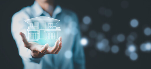 engineering and architecture drawings concept, Engineer man hold house on virtual screen of architect ,Insurance agent with model of house on light background,Property insurance and security concept.
