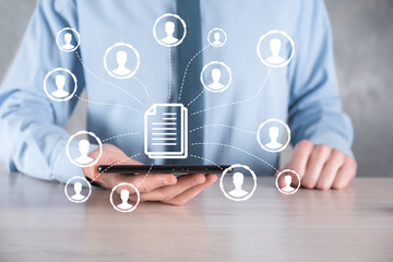 Man hold document and user icon.Corporate data management system DMS and document management system...