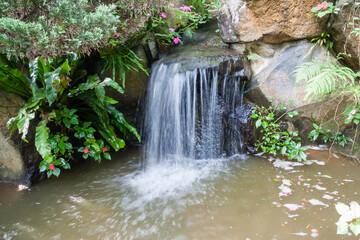 NEW TAIPEI CITY, TAIWAN - JANUARY 27, 2012:  Waterfall at Guan Dao Guan Ying Temple