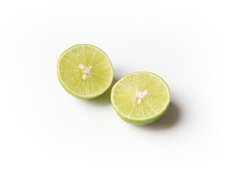 Ripe slice of green lime citrus fruit stand isolated on white background. Lime wedge with clipping path