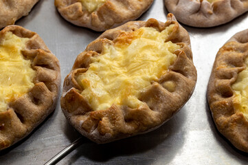 traditional Karelian open pies made of rye dough and potato fillings. wickets