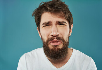 Fototapeta premium Man in a white t-shirt hand gestures anger Lifestyle