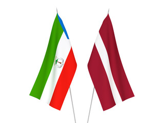 National fabric flags of Latvia and Republic of Equatorial Guinea isolated on white background. 3d rendering illustration.