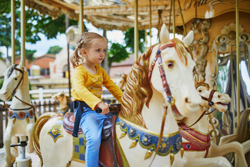 Adorable little girl on the playground