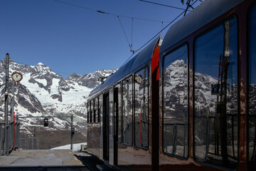 View of the swiss alps Matterhorn and Monte Rosa from Gornergrat station with train mirror reflection