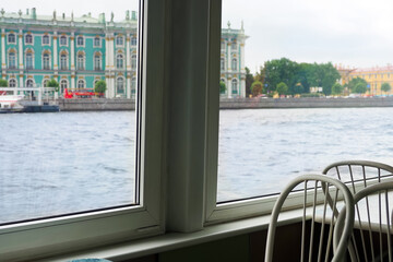 View of the Winter Palace or Hermitage from the windows of a tourist ship, Saint Petersburg, Russia. Comfortable city excursions