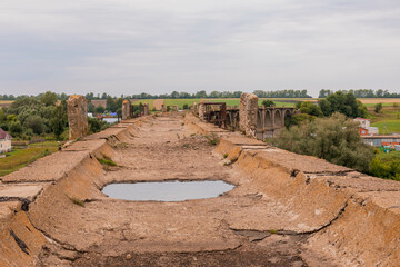 Part of the Mokrinsky railway bridge, top view. Historical reinforced concrete arched viaduct, railway crossing over the Utka river, located in the village of Mokry, Kanashsky district of the Chuvash
