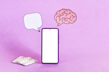 Brain paper cutout and smart phone. Epilepsy and alzheimer awareness, seizure disorder, mental...