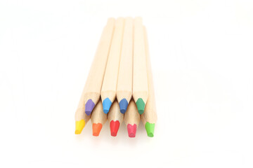 Wooden colorful pencils isolated on white