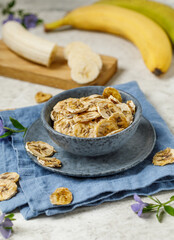 Bananas  frips. Dried bananas on jight background.