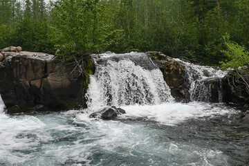 Putorana Plateau, a waterfall on the Grayling Stream.
