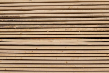Close up of wooden timber flat plank wall pattern and background