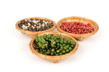 Pepper seeds isolated on white surface.