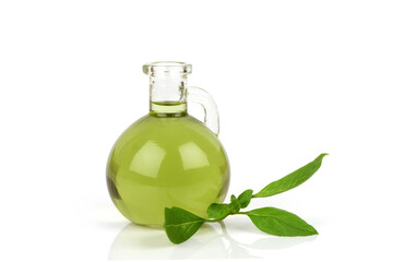 Sweet basil green leaves and oil isolated on white background.