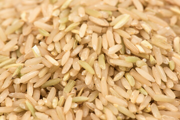 Brown rices surface and texture background.