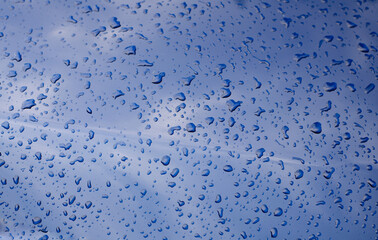 Raindrops on the surface. Wet surface. Dew drops.