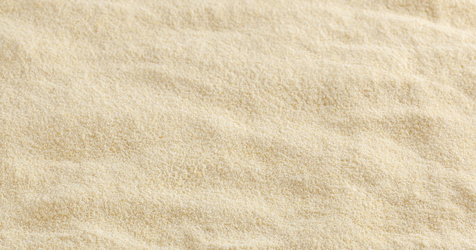 Uncooked semolina flour background
