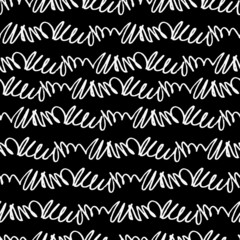 Seamless pattern with hand drawn angled lines on black background. Scribble, scrawl writing imitation