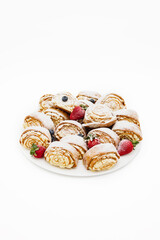 festive dessert with strawberry filling, sprinkled with powder. Delicious pastries.