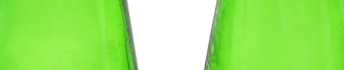 detail of close-up green soda bottle isolated on white background
