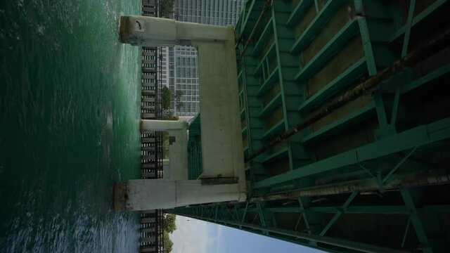 Vertical motion video under a bridge 4k