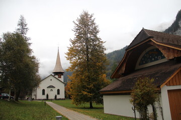 Fototapeta na wymiar Church close to the cemetery in Lauterbrunnen, Switzerland