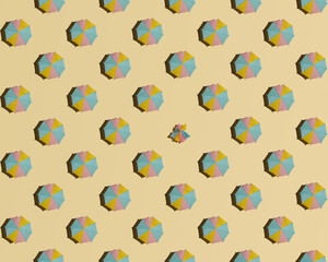 Creative summer pattern against pastel sandy background. Open sun umbrellas and one closed. Minimal individualism concept.  - obrazy, fototapety, plakaty