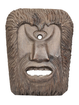 Carved wooden cyclop mask isolated