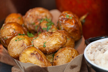 Potatoes baked with herbs .