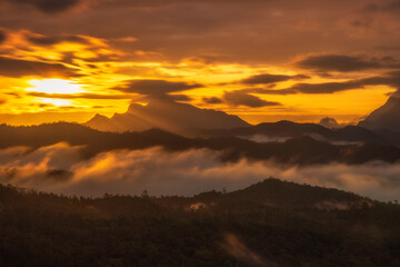 Beautiful sunshine at misty morning mountains at north thailand