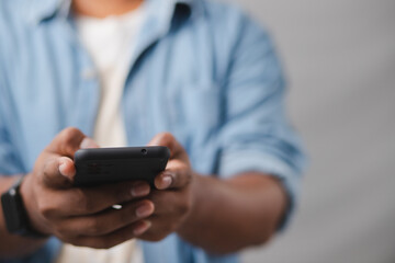 concept of mobile technology Businessmen use smartphones while working at home or office.
