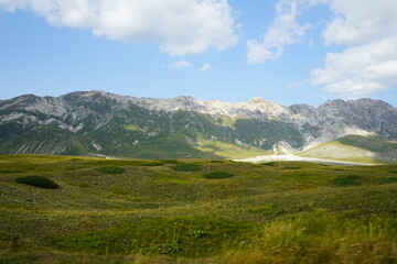 Fototapeta na wymiar Campo Imperatore mountains on a summer day in Gran Sasso National Park, Abruzzo, Italy