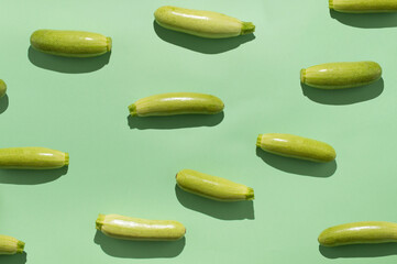 Zucchini pattern on green background