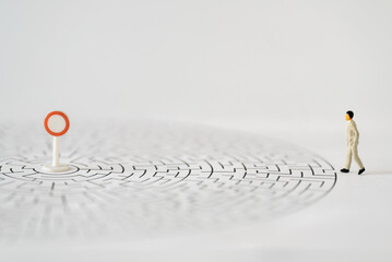 Miniature Business people office man stand entrance of maze thinking business plan how to solve problem using for Accounting Financial Banking business growth development and Commerce Strategy Plan