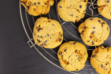 chocolate chip peanut butter cookies with pretzel sticks