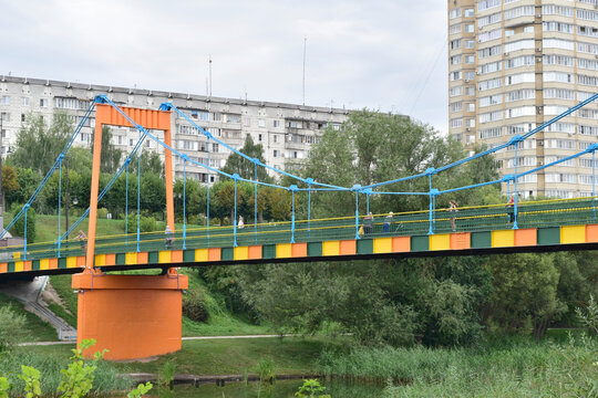 Tambov. Russia. The picture shows a pedestrian bridge, brightly painted, connecting the two banks of the river.