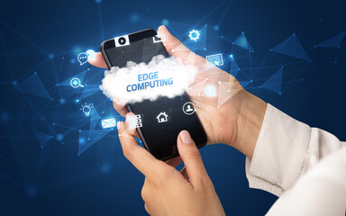 Hand using smartphone with cloud technology concept