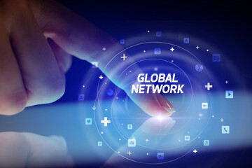 Finger touching tablet with social media icons concept