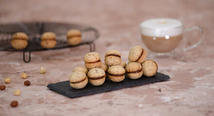 Baci di dama homemade italian hazelnut biscuits cookies with chocolate.
