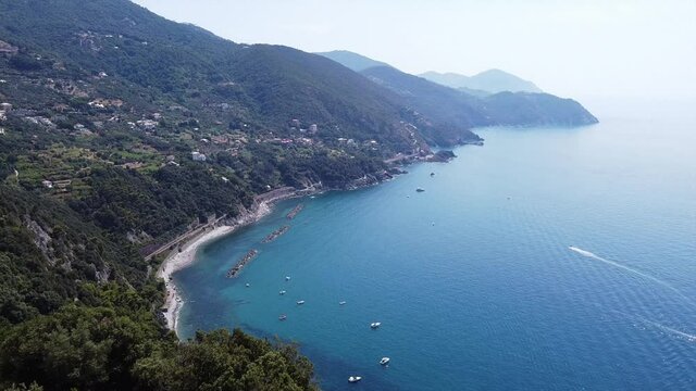 Europe, Italy , Liguria, Framura , Cinque Terre National park - Drone aerial view of the mediterranean cost , Rena and  La Valla beach with beautiful sea - new pedestrian  walking La via del mare
