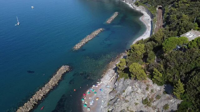 Europe, Italy , Liguria, Framura , Cinque Terre National park - Drone aerial view of the mediterranean cost , Rena and  La Valla beach with beautiful sea - new pedestrian  walking La via del mare