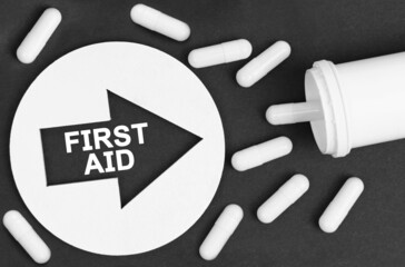Pills on a black background. They are indicated by a circle with an arrow, inside which it is...