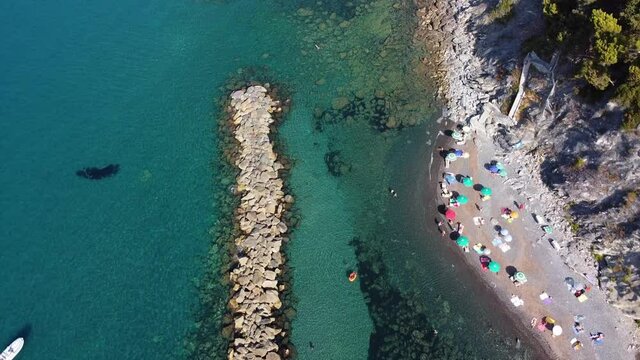 Europe, Italy , Liguria, Framura July 2021 , Cinque Terre National park - Drone aerial view of the mediterranean cost , Rena and  La Valla beach with beautiful sea - new   walking La via del mare
