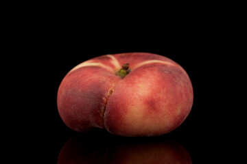 Fototapeta na wymiar One organic ripe fig peach, close-up, isolated on black.