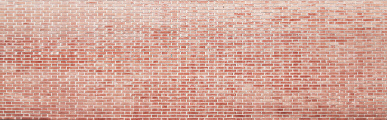 Brick wall texture with cracked tiles and cement. Classic brickwall surface background