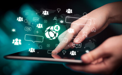 Close-up of a hand using tablet, social media concept