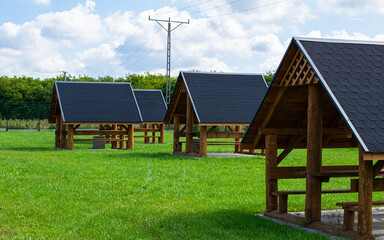 wooden summer gazebo on a sunny day