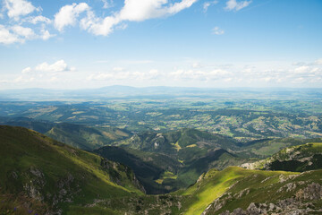 Tatra mountains aerial view with blue cloudy sky, Poland