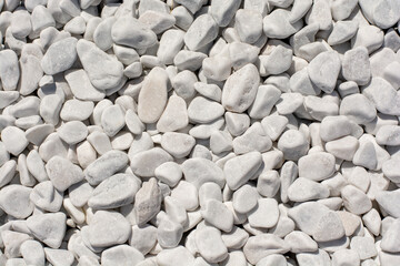 White pebbles stones background. Top view.